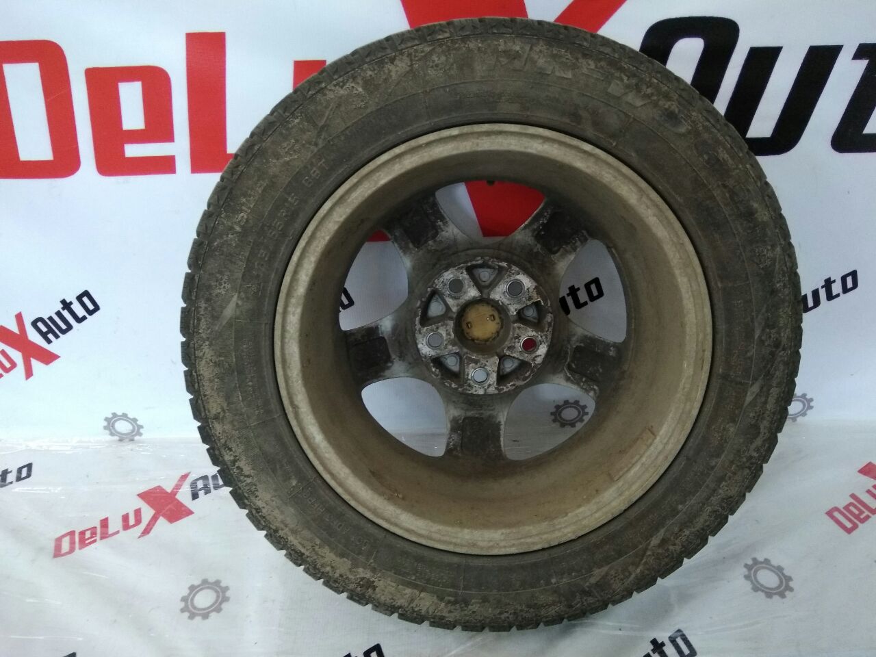 Диск с шиной 185/65R15 для Nissan Almero Tino 2.0 · 2006