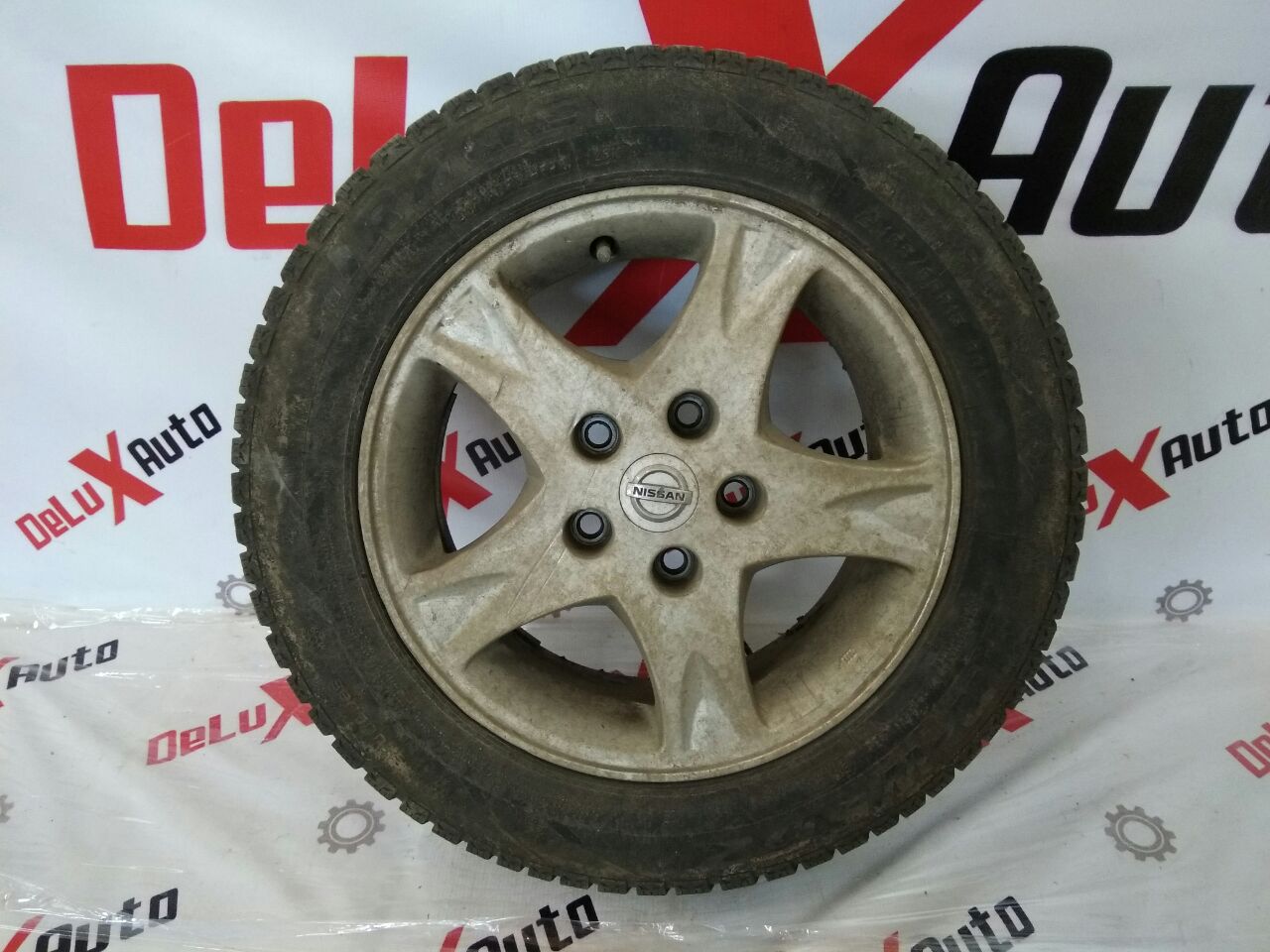 Диск с шиной 185/65R15 для Nissan Almero Tino 2.0 · 2006