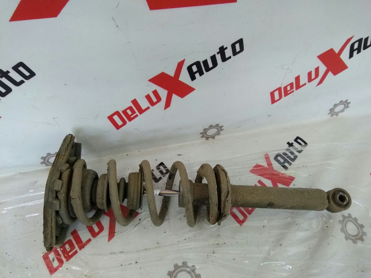 amortizor spate stânga complet pentru Nissan Almera Tino 2.0 · 2006