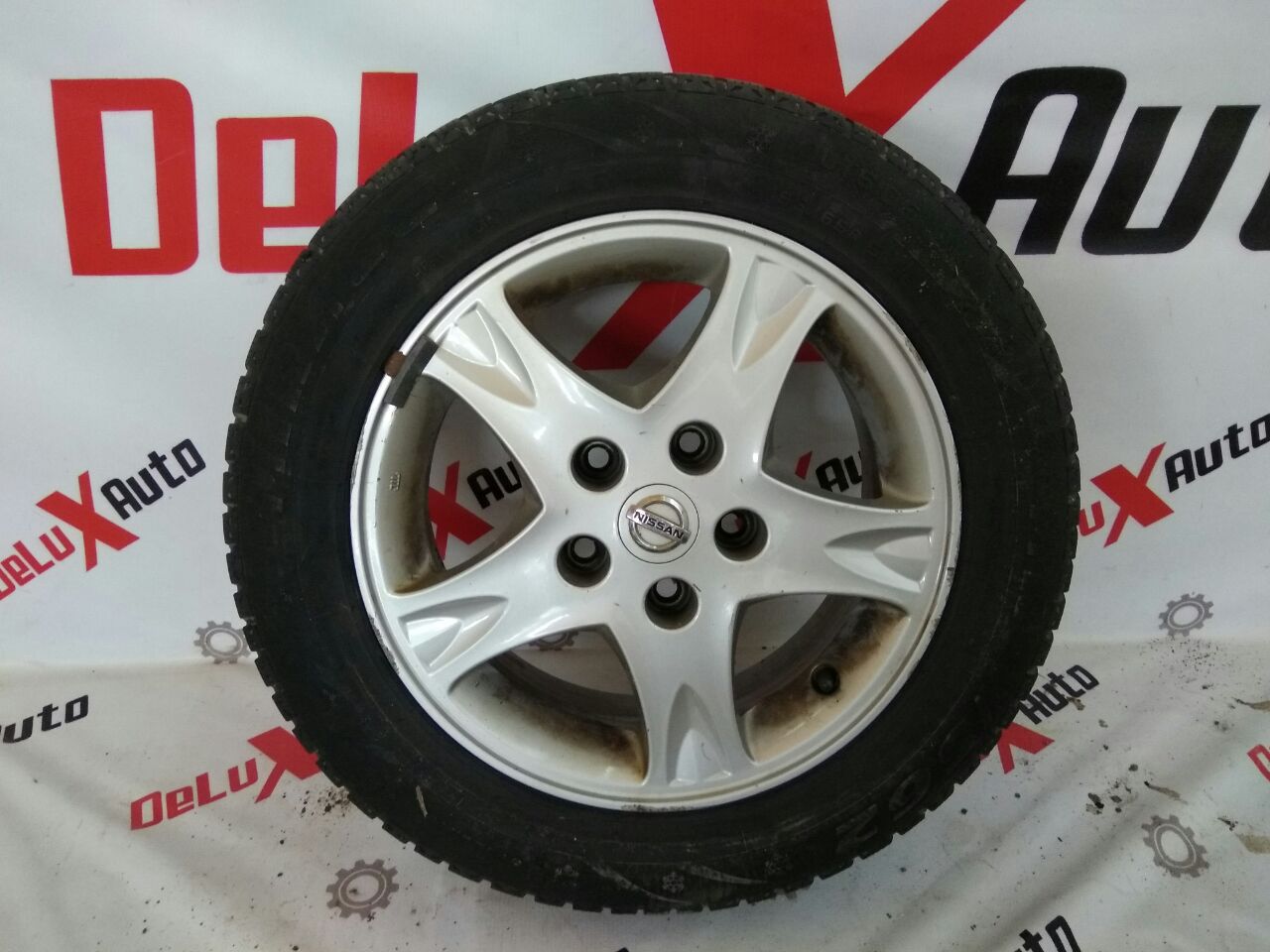 Диск с шиной 185/65R15 для Nissan Almero Tino 2.0 · 2006
