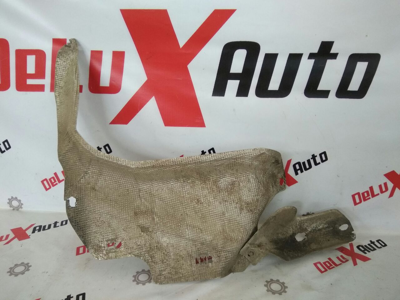 Защита глушителя для Nissan Almero Tino 2.0 · 2006
